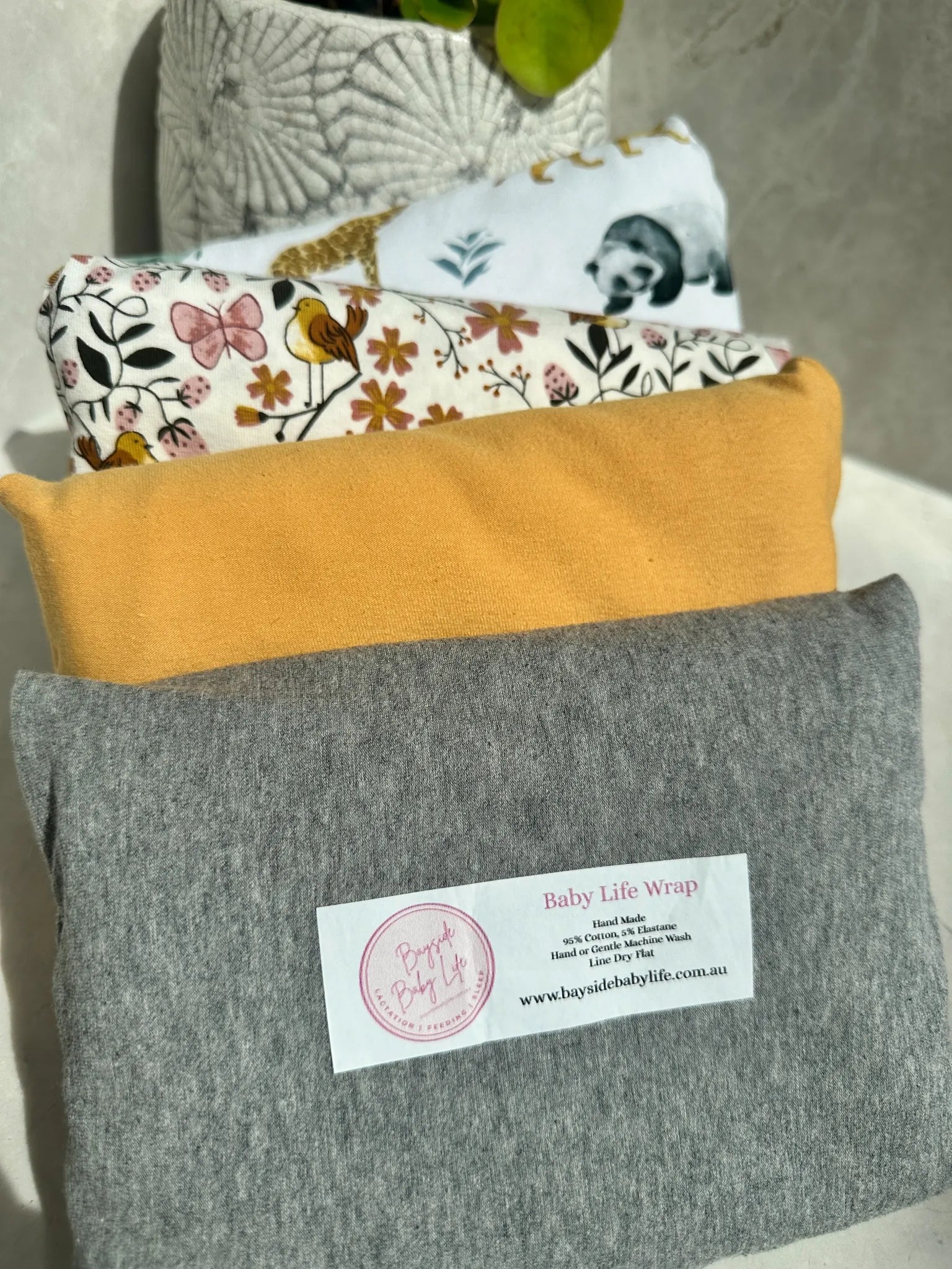 Baby Life Wrap - a swaddle designed to keep those little arms tucked in.