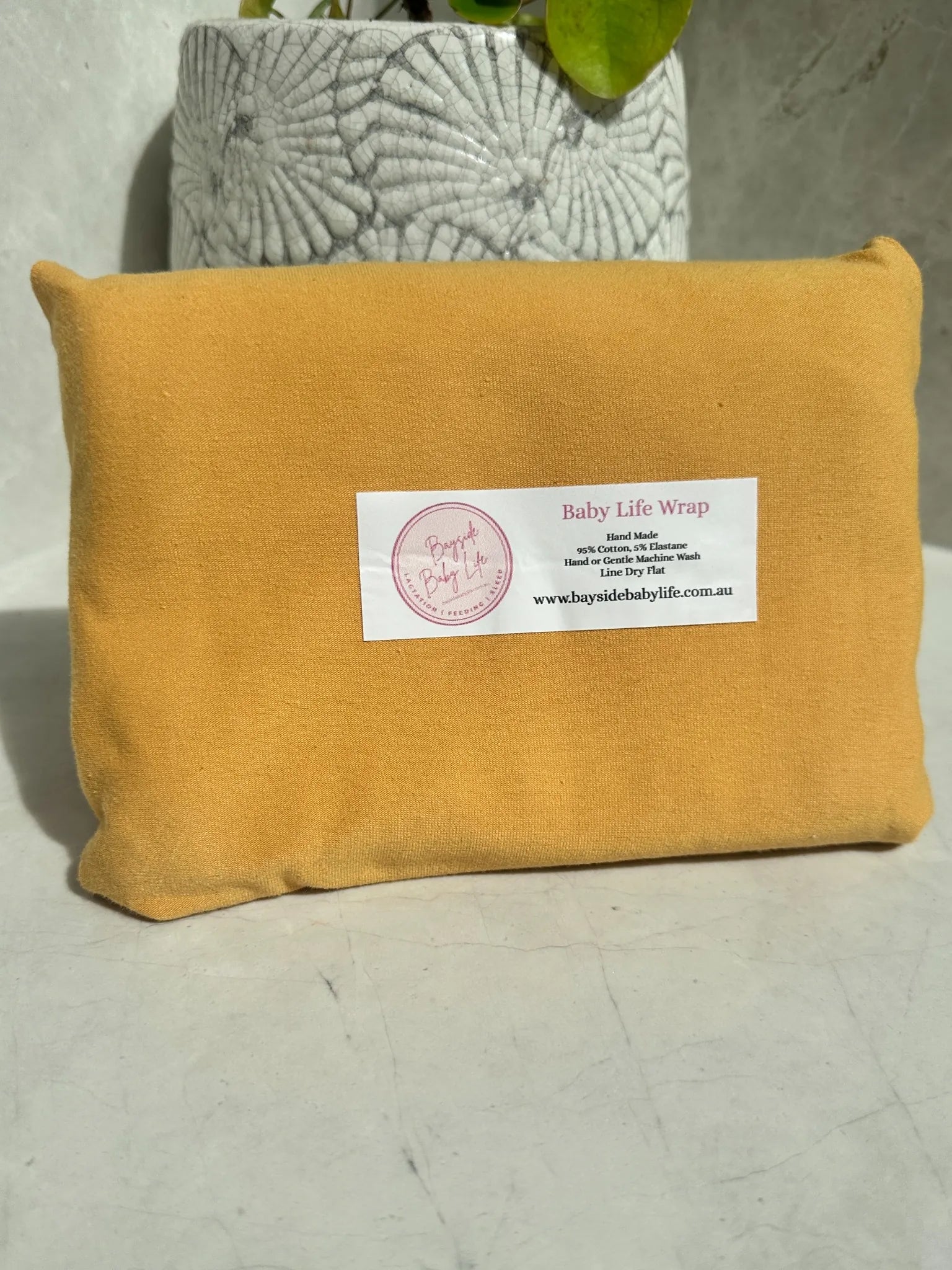 Baby Life Wrap - a swaddle designed to keep those little arms tucked in.