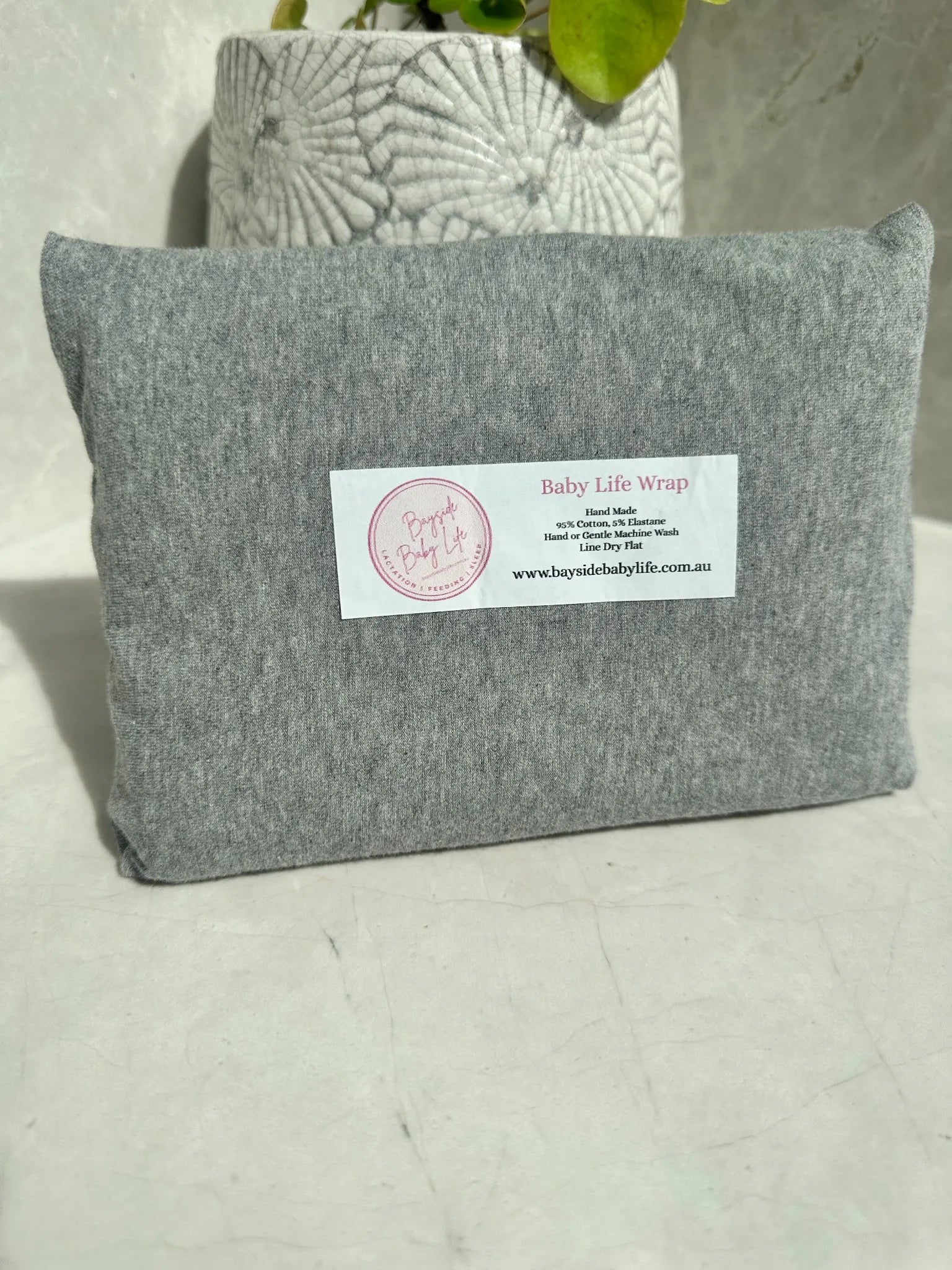 Baby Life Wrap - a swaddle designed to keep those little arms tucked in.